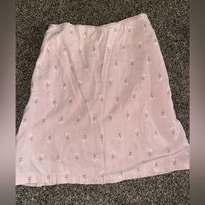 Pink skirt from brandy with little white flowers on it